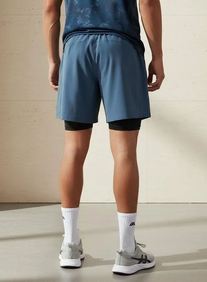 Kappa  Kappa Men Logo Print Dual Shorts for Men | Best Price UAE